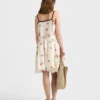 Embroidered Linen Mini-Dress with Floral Motif