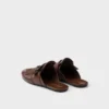 Shuffle Antiqued Leather Mules with Buckled Strap and Fringe